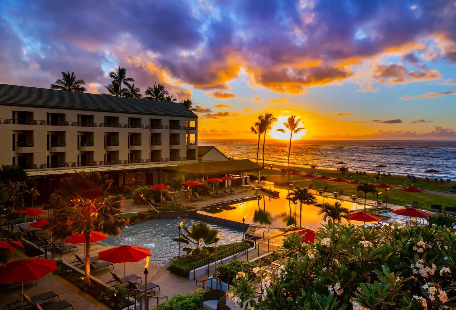 Sheraton Kauai Coconut Beach Resort at sunset over the ocean